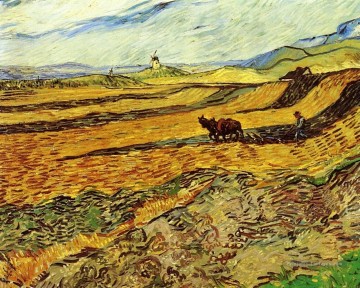 Champ et laboureur et moulin Vincent van Gogh Peinture à l'huile